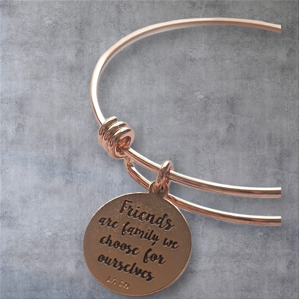 Unwritten Rose Gold Bangle Bracelet with Charms